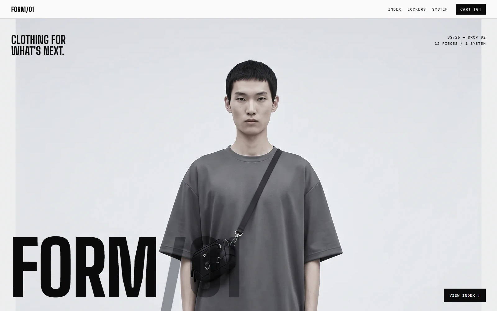 FORM/01 hero: a giant condensed black wordmark running off the foot of a pale studio frame, behind a figure in a grey oversized tee.