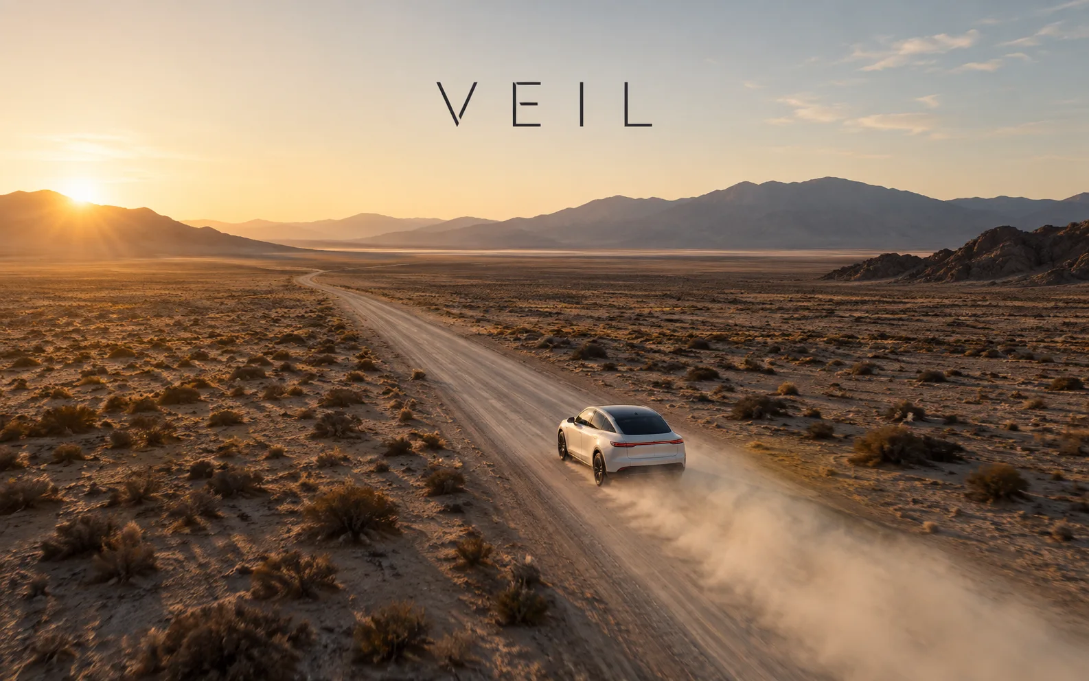 Veil: an aerial shot of a white car trailing dust across a wide desert plain, mountains on the horizon.